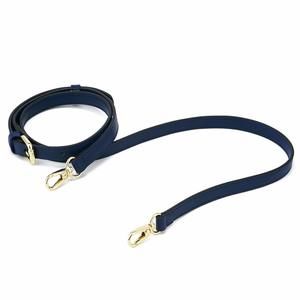 Navy blue leather crossbody strap with gold tone hardware